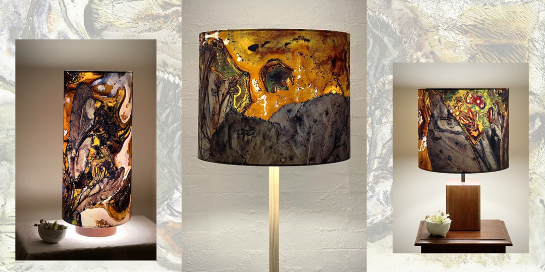 3 lamps, different sizes, lapshades feature organic shapes and leaves